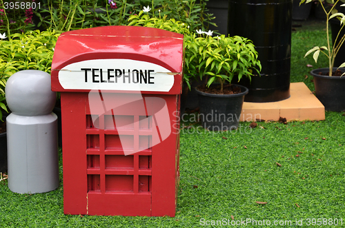 Image of Red british style telephone booth