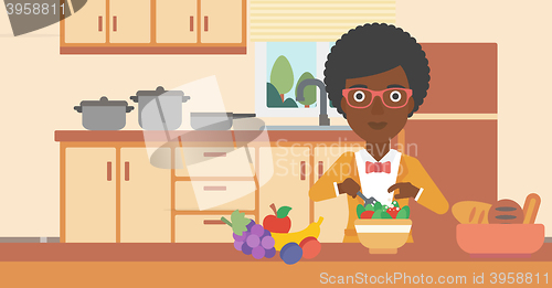 Image of Woman cooking vegetable salad.