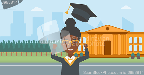 Image of Graduate throwing up his hat.