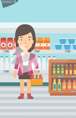 Image of Woman with pack of beer.