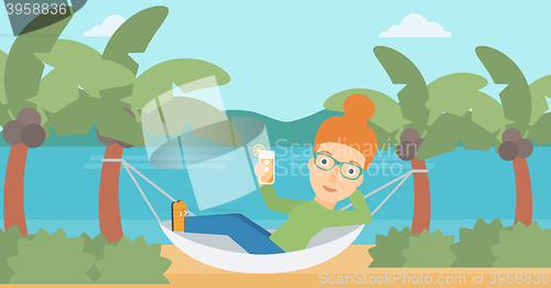 Image of Woman chilling in hammock.