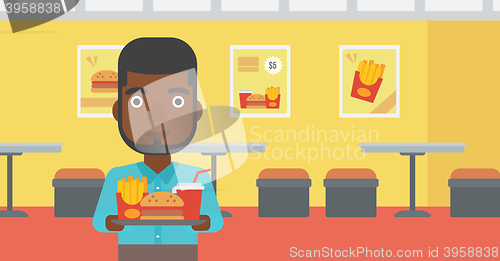 Image of Man with fast food.