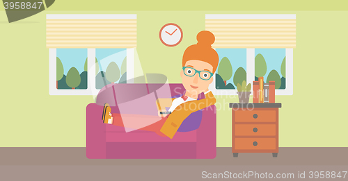 Image of Woman lying on sofa.