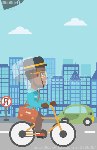 Image of Man cycling to work.
