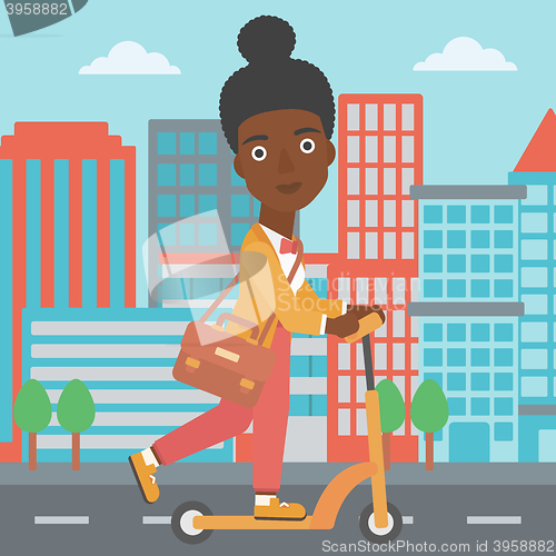 Image of Woman riding on scooter.