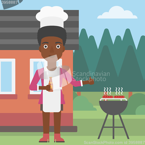Image of Woman preparing barbecue.