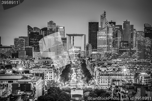 Image of La Defence, Paris business district at dusk.