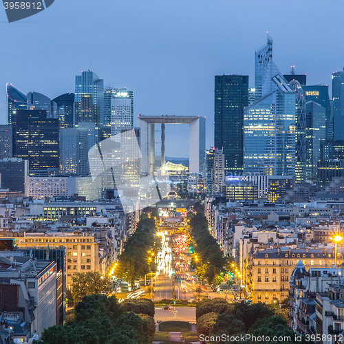 Image of La Defence, Paris business district at dusk.