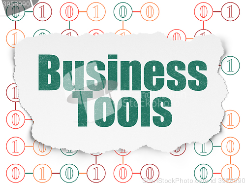 Image of Finance concept: Business Tools on Torn Paper background