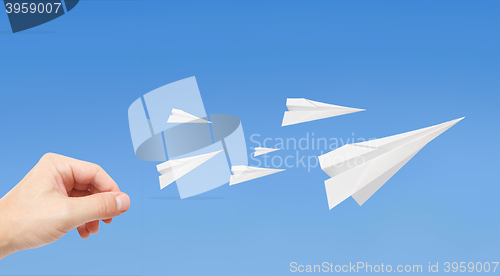 Image of Paperplanes flying 