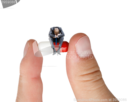 Image of Businessman on pill