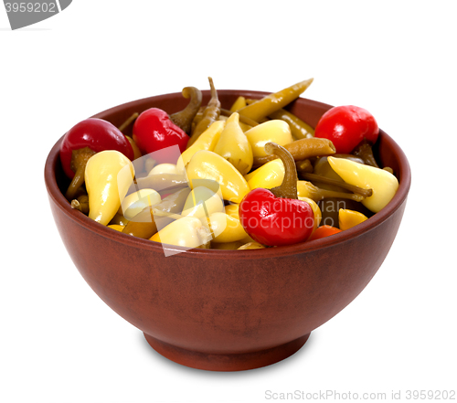 Image of Mix of hot turkish marinated peppers in ceramic bowl