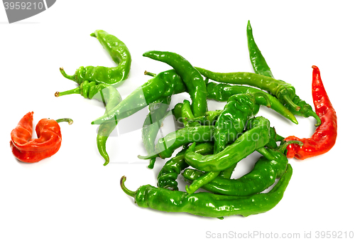 Image of Red and green peppers with water drops