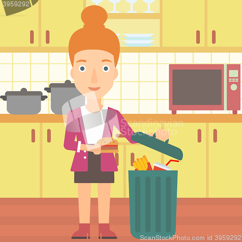 Image of Woman throwing junk food.