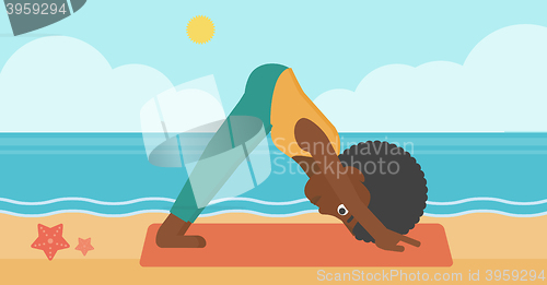 Image of Woman practicing yoga.