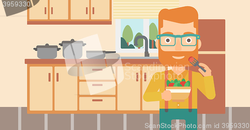 Image of Man eating salad.