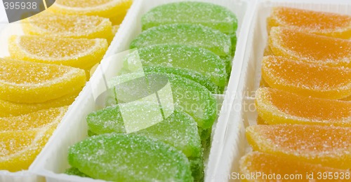 Image of colourful fruit candies in boxes