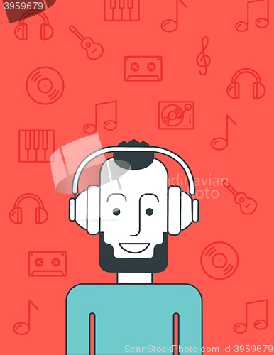 Image of Man listening to music.