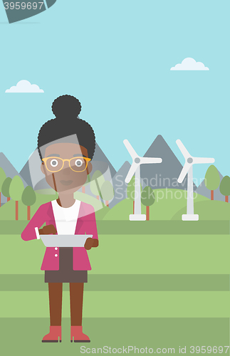 Image of Woman using tablet computer.