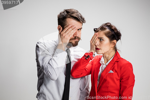 Image of The business man and woman on a gray background