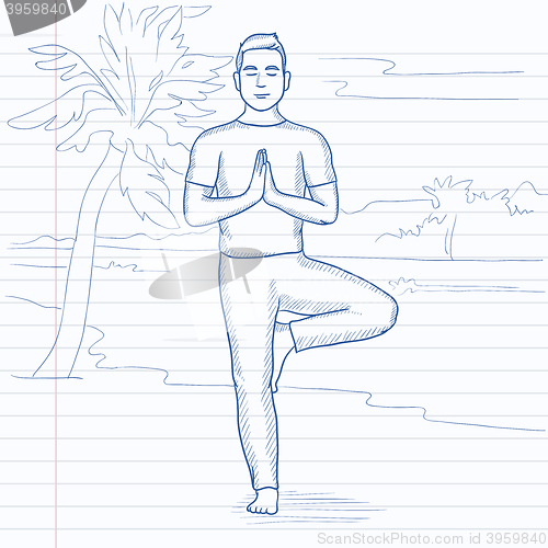 Image of Man practicing yoga.