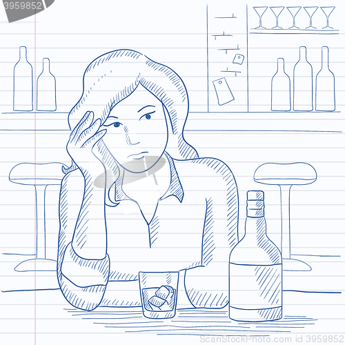 Image of Woman sitting at bar.