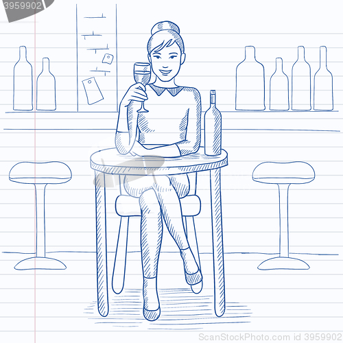 Image of Woman sitting at bar.