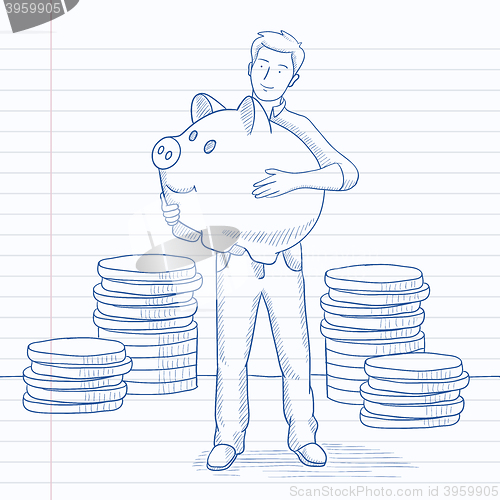 Image of Man carrying piggy bank.