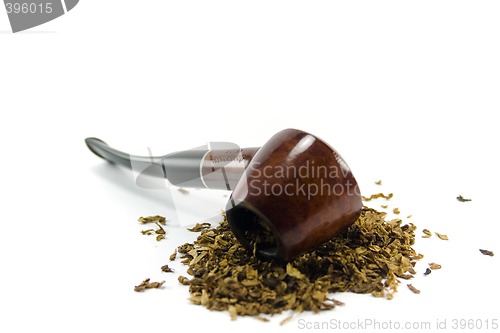 Image of tobacco-pipe and heap of tobacco