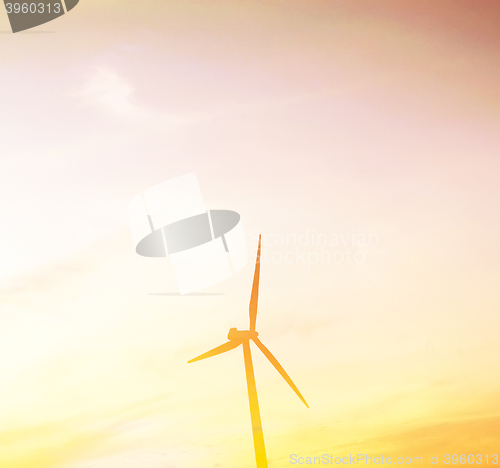 Image of Windmills at sunset