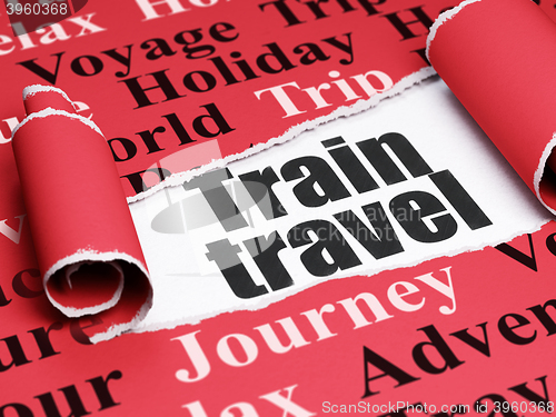 Image of Vacation concept: black text Train Travel under the piece of  torn paper