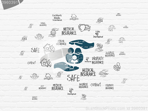 Image of Insurance concept: Family And Palm on wall background