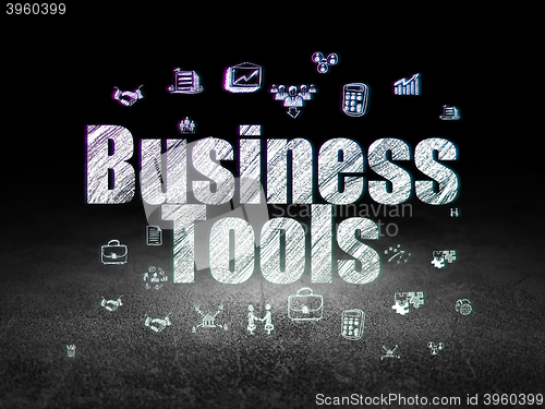 Image of Business concept: Business Tools in grunge dark room