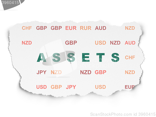 Image of Currency concept: Assets on Torn Paper background