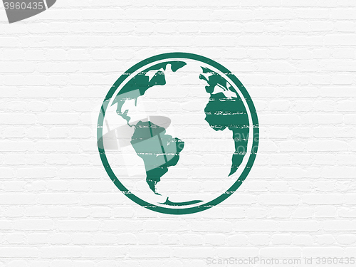 Image of Education concept: Globe on wall background