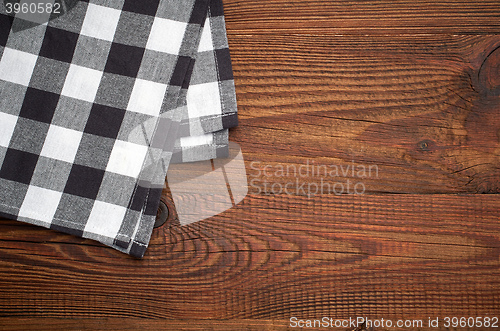 Image of cotton napkin on wooden table