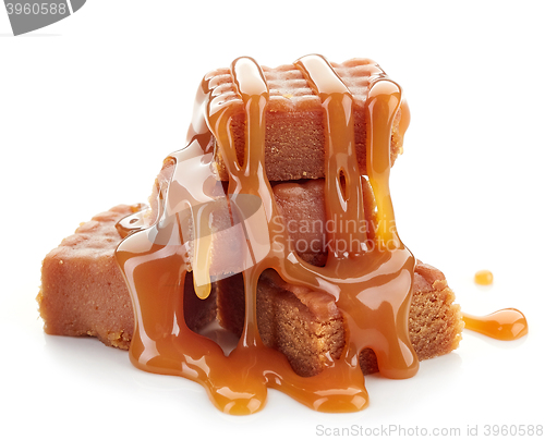 Image of caramel candies and sauce