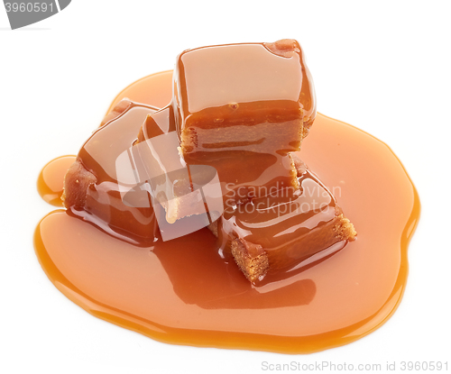 Image of caramel candies and sauce