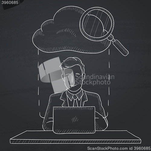 Image of Man working on laptop.