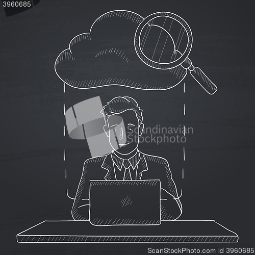 Image of Man working on laptop.