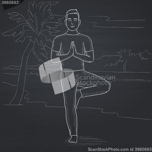 Image of Man practicing yoga.