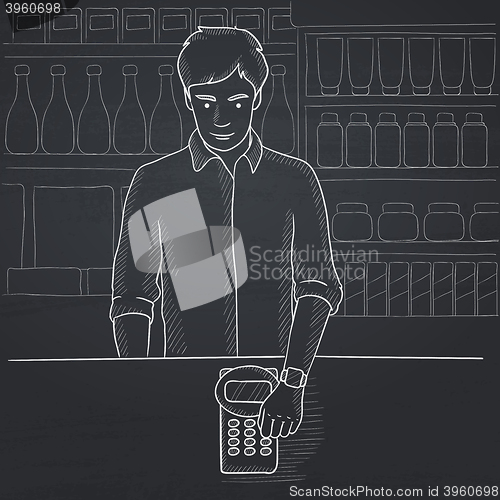 Image of Man paying with smart watch.