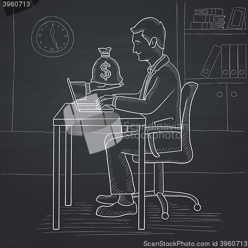 Image of Businessman working in office.