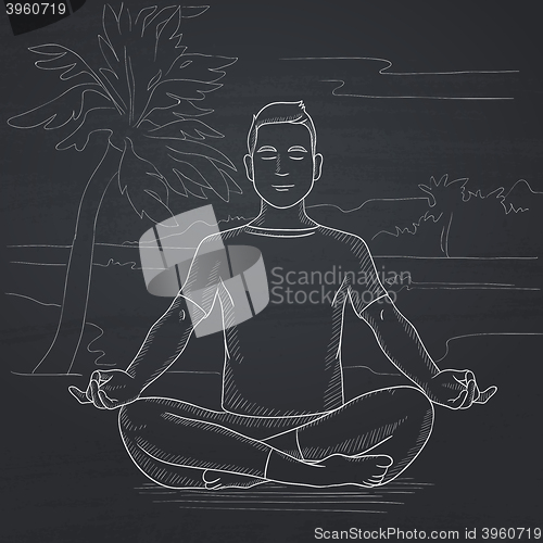 Image of Man meditating in lotus pose.