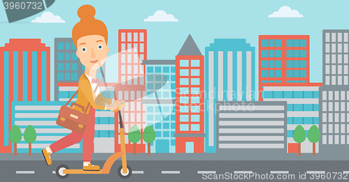 Image of Woman riding on scooter.