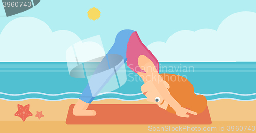 Image of Woman practicing yoga.