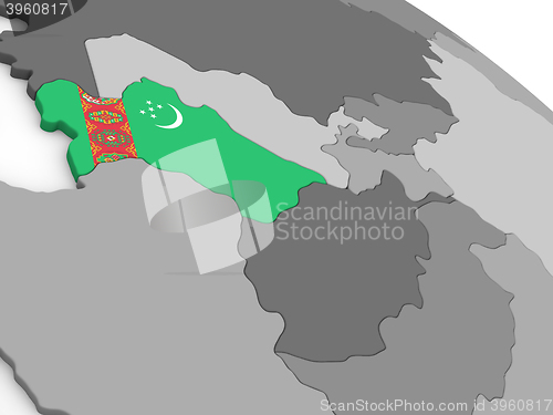 Image of Turkmenistan on globe with flag