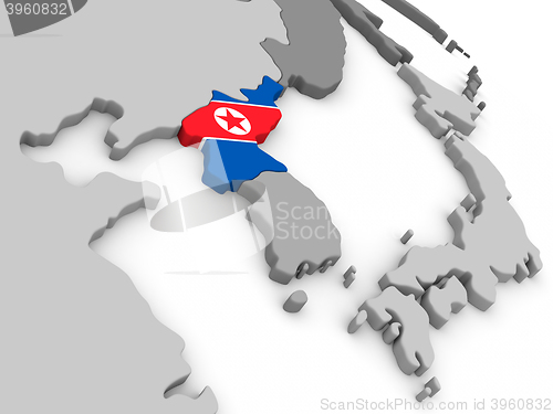 Image of North Korea on globe with flag