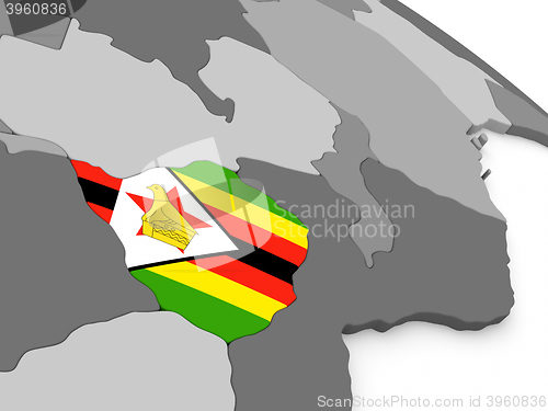 Image of Zimbabwe on globe with flag