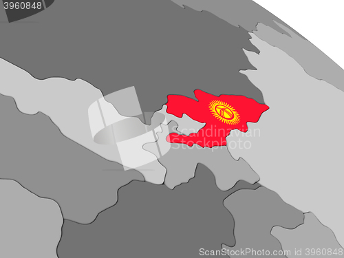 Image of Kyrgyzstan on globe with flag